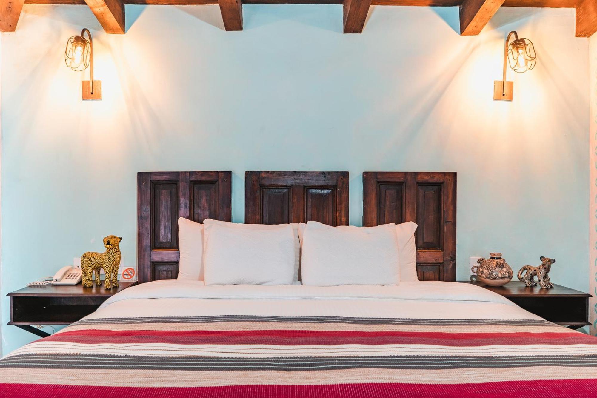 Yox Hotel Boutique San Cristóbal de Las Casas Rum bild A bedroom at the hotel